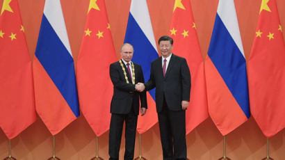 푸틴만을 위한 훈장까지…시진핑, 러시아에 러브콜