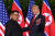 12일 역사적인 첫 북미 정상회담에서 만난 김정은 북한 국무위원장(왼쪽)과 도널드 트럼프 미국 대통령. [AFP=연합뉴스]