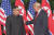 역사적 첫 북미정상회담이 열린 12일 오전 싱가포르 센토사 섬 카펠라호텔에서 미국 도널드 트럼프 대통령과 북한 김정은 국무위원장이 북미정상회담에 앞서 인사하고 있다. [연합뉴스TV 제공] 