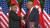 도널드 트럼프 미국 대통령이 김정은 북한 국무위원장과 서명을 한 뒤 악수를 나누고 있다. [AP=연합]