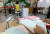 13일 오전 광주 북구 용봉동 제1투표소가 마련된 용주초등학교에서 유권자들이 투표하고 있다.[연합뉴스]