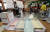 제7회 전국동시지방선거일인 13일 오전 광주 북구 용봉동 제1투표소가 마련된 용주초등학교에서 유권자들이 투표하고 있다. [연합뉴스]