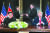 김여정 북한 노동당 제1부부장(왼쪽 둘째)과 마이크 폼페이오 미국 국무장관이 12일(현지시간) 싱가포르 센토사 섬 카펠라 호텔에서 북·미 정상 공동합의문을 교환하고 있다. [싱가포르 AFP=연합뉴스]