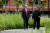 도널드 트럼프 미국 대통령과 김정은 북한 국무위원장이 오찬을 한 뒤 통역없이 산책하고 있다. [로이터=연합뉴스]