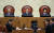  김명수 대법원장이 지난해 12월 첫 전원합의체 선고를 위해 대법원 대법정에 앉아 있다. 박종근 기자