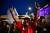 안드레스 마누엘 로페스 오브라도르 멕시코 대통령 후보 지지자가 1일(현지시간) 선거 출구조사 결과 압승이 예상되자 환호하고 있다. [AFP=연합뉴스]