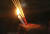 한 실종자 가족이 지난달 27일(현지시간) 촛불을 손에 들고 기도하고 있다. [AP=연합뉴스]