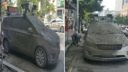 일 하다가 ‘시멘트’ 뒤집어 쓴 불법 주차단속차량