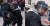 에마뉘엘 마크롱 프랑스 대통령의 안전담당 보좌관 알렉상드르 베날라가 지난 5월 노동절 집회 당시 경찰 장비를 착용하고 집회 참여자를 폭행한 혐의를 받고 있다. [SNS 화면 캡처]