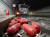 지난달 22일 오후 울산포항고속도로 범서제2터널에서 불에 탄 화물차 앞에 소화기들이 나뒹굴고 있다. [연합뉴스]