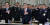 문재인 대통령(가운데)이 27일 오후 청와대 영빈관에서 열린 전군 주요지휘관 회의에 참석해 국민의례를 하고 있다. [청와대사진기자단]
