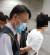 지난달 31일 경북 구미 차병원 권역응급의료센터에서 술에 취한 20대가 전공의를 폭행한 뒤 경찰에 연행되고 있다. [사진 대한의사협회]