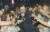  천모씨가 10일 새벽 서울 서초구 드루킹 특검사무실에서 두 번째 조사를 마치고 나오던 김경수 경남지사의 뒷덜미를 잡아채고 있다. [연합뉴스]