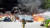 5일 오전 11시께 울산 울주군의 한 보온재 제조공장에서 불이 나 소방관들이 진화작업을 벌이고 있다. [울산소방본부 제공]