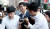 백원우 청와대 민정비서관이 15일 오전 서울 강남구 특검 사무실에 참고인 신분으로 출석하고 있다. 우상조 기자