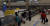 14일 오후 인천공항 제1터미널 입국장에서 승객들이 짐을 찾고 있다. 그 뒤로 셔터가 내려진 입국장 면세점 예정 공간이 자리잡고 있다. [연합뉴스]