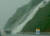 2006년 제3호 태풍 에위니아의 영향으로 많은 비가 내리면서 경남 마산시 진전면 봉암마을 부근 인터체인지 절개지 산꼭대기에서 폭포수 같은 모습으로 물이 도로로 쏟아내 내려 오고 있다. [중앙포토]