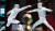 20일 인도네시아 자카르타 컨벤션센터 경기장에서 열린 2018 자카르타-팔렘방 아시안게임 펜싱 남자 사브르 개인전 대한민국 선수끼리 가진 결승전에서 구본길(오른쪽)과 오상욱이 경기를 하고 있다. 2018.8.20/뉴스1
