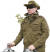 사냥복 앞주머니에 나뭇가지를 꽂아 멋을 낸 푸틴 러시아 대통령. [연합뉴스]