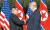 지난 12일 싱가포르 센토사 섬 카펠라 호텔에서 열린 사상 첫 북·미 정상회담을 앞두고 도널드 트럼프 미국 대통령과 김정은 북한 국무위원장이 ‘세기의 악수’를 하고 있다. [사진 싱가포르 정보통신부]
