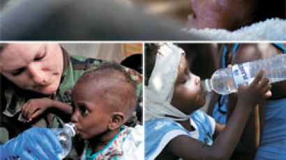 [아이티 강진] 생후 23일 아기도 구출 … 생존의 기적은 계속된다