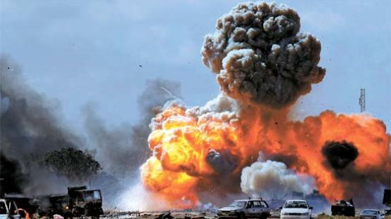 ‘오디세이 새벽’ … 토마호크 124발 카다피 때리다