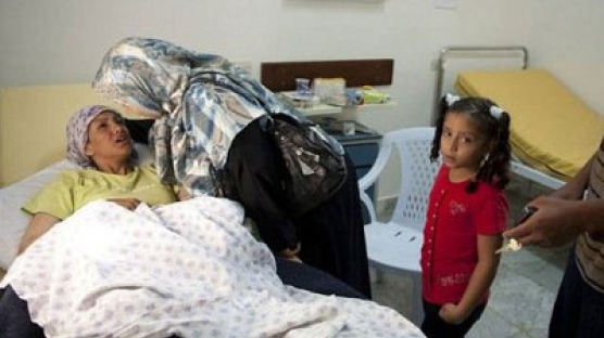 카다피 지키던 미녀 경호원, 병원에 갇혀 울부짖으며…