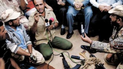 [사진] 카다피가 마지막으로 남긴 것 