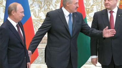 [사진] 푸틴, 우크라이나 대통령과 첫 공식회담