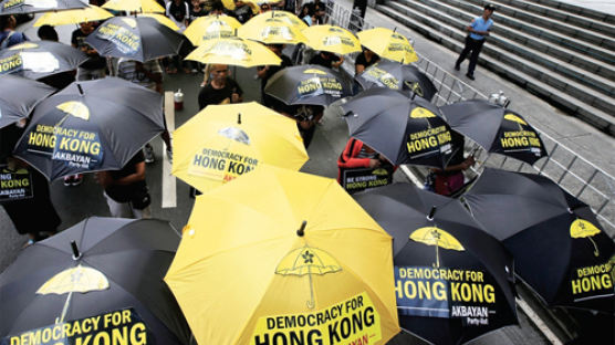 홍콩 ‘우산혁명’ 현장을 가다…중국의 자본·체제 공습에 우산을 펼쳐 맞서다