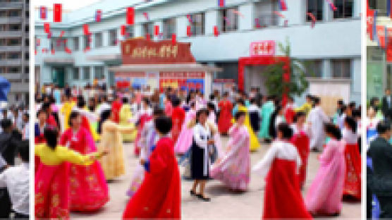 북한의 놀라운 투표율 99.97%…투표 후엔 시내에서 무도회