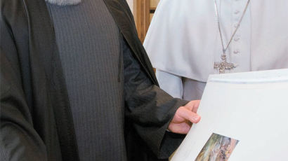 [사진] 이란 대통령 만난 교황 