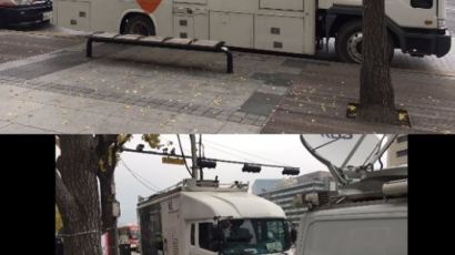 광화문 광장에 대형 트럭 두 대가 나타난 이유는?
