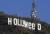 1일(현지시간) 누군가 글짜를 바꿔놓은 헐리우드 간판. 로스앤젤레스 시민들은 가파른 그리피스 파크 산위에 있는 헐리우드 간판의 철자 중 O자가 ee로 바뀐 것을 발견했다. [AP/뉴시스]