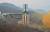 북한이 지난 18일 서해위성발사장에서 실시한 신형 고출력 로켓엔진 지상분출시험.  [사진 노동신문]