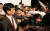 [2012-05-12] 통합진보당이 12일 일산 킨텍스에서 개최한 중앙위원회에서 당권파 당원들이 단상에 난입해 조준호 공동대표(가운데)의 멱살을 잡으려 하고 있다. 왼쪽은 유시민 공동대표와 심상정 대표. 출처 중앙포토