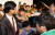 [2012-05-12] 통합진보당이 12일 일산 킨텍스에서 개최한 중앙위원회에서 당권파 당원들이 단상에 난입해 조준호 공동대표(가운데)의 멱살을 잡으려 하고 있다. 왼쪽은 유시민 공동대표와 심상정 대표. 출처 중앙포토
