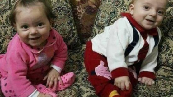 아빠 가슴에 묻힌 9개월 쌍둥이 … 시리아로 쏠리는 세계의 눈