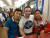 지난 12일 평양으로 향하는 기차에 탑승한 루파인 여행사 가이드 제임스 피너티(가운데). 양쪽 두 사람은 뉴질랜드에서 열린 대회 참가 뒤 귀국 중인 북한 아이스하키팀 선수들이다. [루파인 트래블 페이스북]