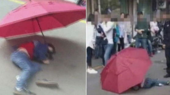 '우산' 펼친 채 10층 높이에서 뛰어내린 소년