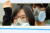 방진 마스크를 착용한 (사)환경정의 관계자들이 20일 서울 청계광장에서 미세먼지정책제안캠페인을 하고 있다.조문규 기자