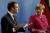 에마뉘엘 마크롱 프랑스 대통령과 앙겔라 메르켈 독일 총리가 베를린에서 실무만찬 후 기자회견을 하고 있다. [EPA=연합뉴스]