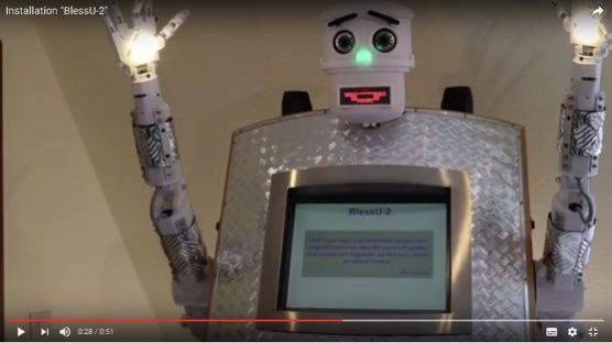 "로봇 목사께 축복을 받으시겠습니까? 언어를 선택하세요"(영상)
