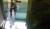 소화기를 들고 원룸 화재진압을 위해 뛰어가는 여정빈 순경이 찍힌 CCTV 화면.[사진 부산지방경찰청] 