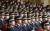 지난 3월 충남 아산 경찰대 대강당에서 열린 경찰대학생·간부후보생 합동임용식에서 임용자들이 행사시작 전 부동자세로 앉아 있다. [중앙포토]
