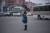 지난 7일 북한 평양 시내 교차로에서 교통지도를 하고 있는 여성 교통보안원.[AFP=연합뉴스]