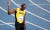 자메이카 우사인 볼트가 18일 오후 (현지시간) 브라질 리우데자네이루 마라카낭 올림픽 주경기장에서 열린 육상 남자 200m 결승 경기에서 19초 78의 기록으로 결승점을 통과한 뒤 즐거워 하고 있다. [올림픽사진공동취재단]