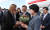 문재인 대통령이 부인 김정숙 여사와 함께 6일 오후(현지시간) &#39;주요 20개국(G20) 정상회의&#39; 참석을 위해 함부르크 헬무트 슈미트 공항에 도착, 마중 나온 함부르크 관계자로부터 꽃다발을 받고 있다. [연합뉴스]
