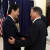 문재인 대통령과 아베 신조 일본 총리(왼쪽)가 6일 오후(현지시간) G20 정상회의가 열리는 독일 함부르크 시내 미국총영사관에서 열린 한미일 정상만찬에서 만나 밝게 인사하고 있다.