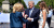 14일 프랑스 파리 바스티유 퍼레이드가 열리는 장소에서 도널드 트럼프 미국 대통령(오른쪽 둘째)이 에마뉘엘 마크롱 대통령의 영부인 브리짓 여사(왼쪽에서 둘째)의 손을 잡고 있다. [AP=연합뉴스]